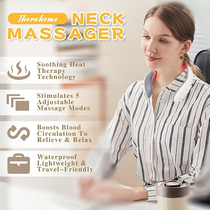 A woman wearing a neck massager comfortably at her desk